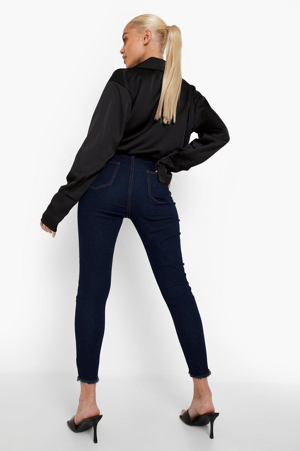 Black skinny jeans clearance with frayed hem